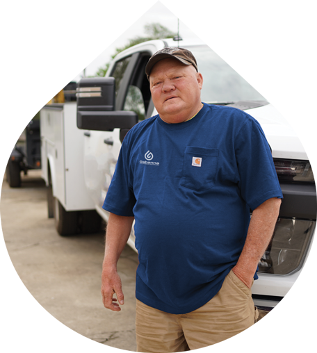 Drain Plumber in Front of Truck